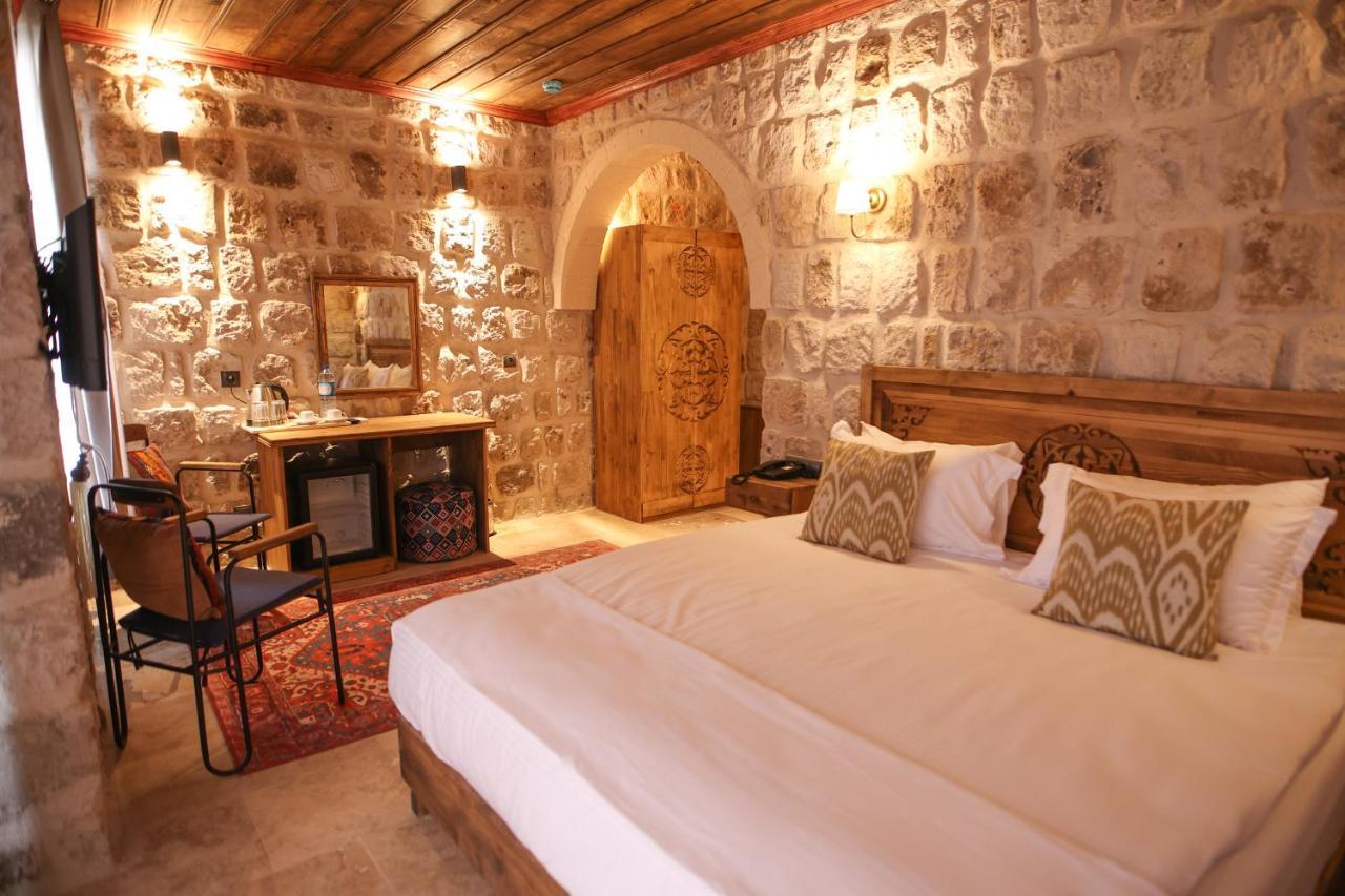 Cappadocia Vita Cave Hotel อูร์กุบ ภายนอก รูปภาพ